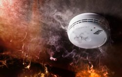 Smoke,Detector,And,Fire,Alarm,In,Action,Background,With,Copy